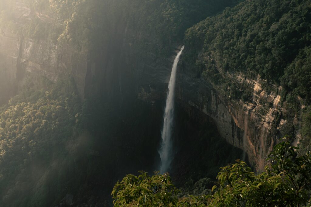 pexels-photo-12233686-12233686 Beautiful view of Nohkalikai Falls cascading down lush cliffs in Meghalaya, India.